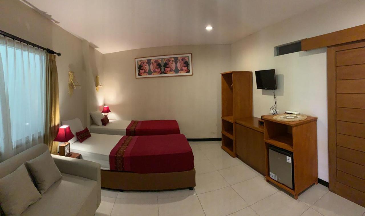 Kuta Suci Guesthouse Luaran gambar