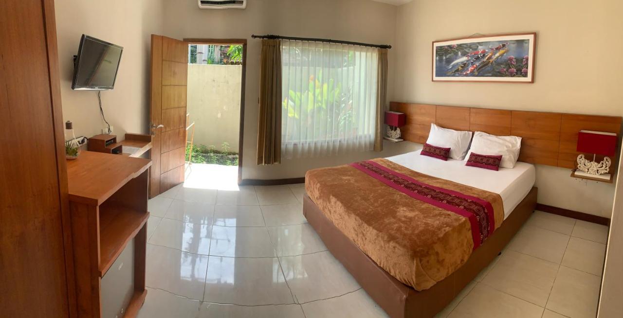 Kuta Suci Guesthouse Luaran gambar